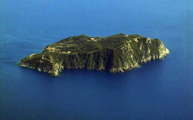 The island of Gorgona rising from the Tyrrhenian Sea
