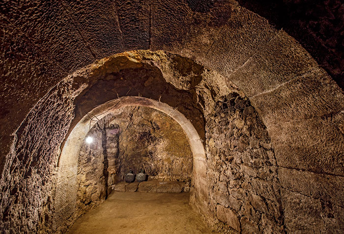 The old stone cellar with a sequence of arched chambers