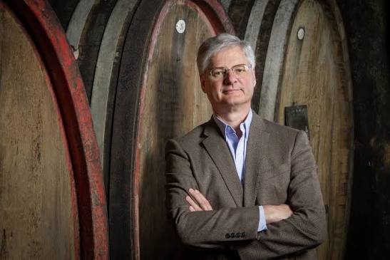 Jean Trimbach standing in the family cellar