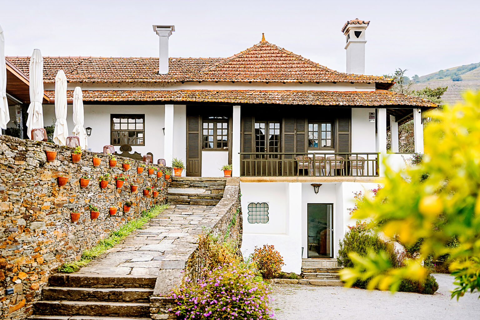 A white building with terracotta roof at Quinta do Crasto