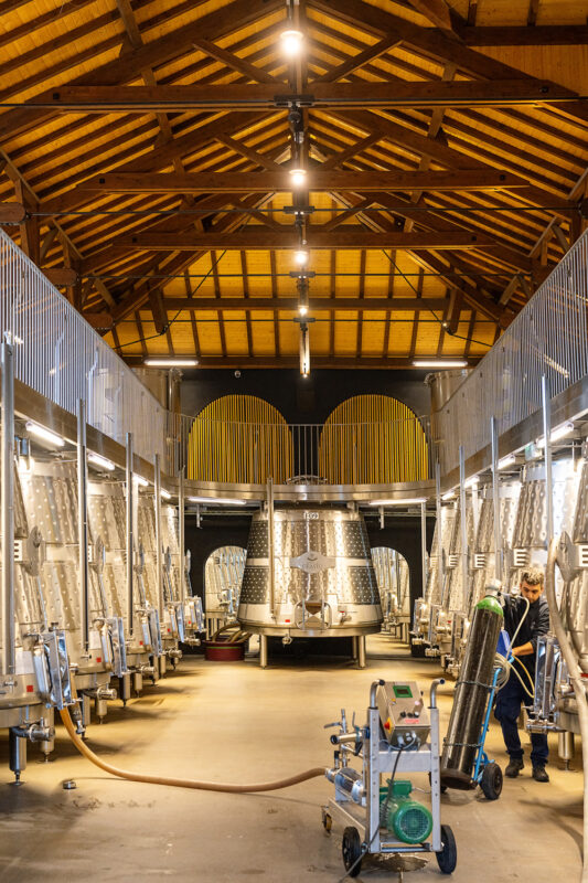 The winery interior with stainless steel fermentation tanks